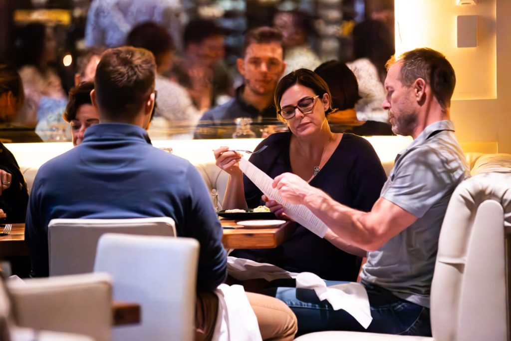 Guests peruse the menu at the Guild House.